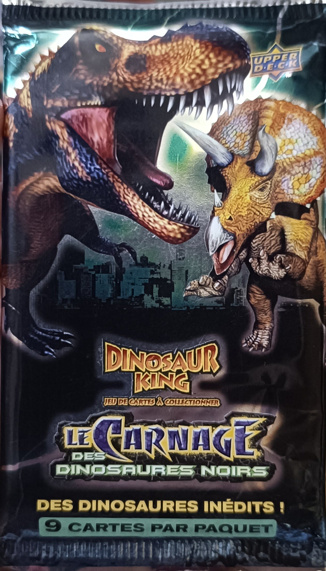 Dinosaur king - booster de 9 cartes - Le carnage des dinosaures noirs